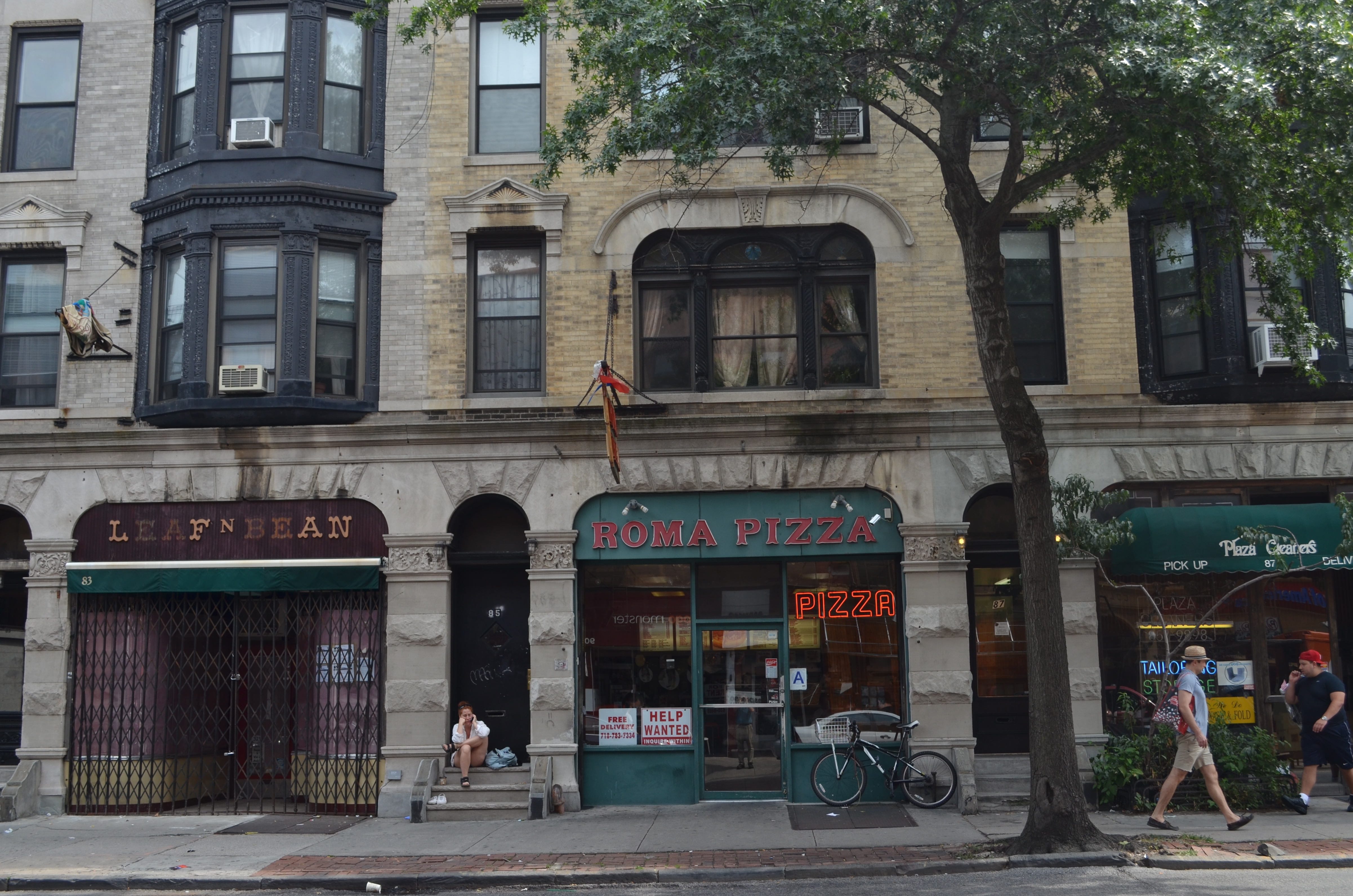 Park Slope, Brooklyn, 2012. Trying to catch as much activity as a street glance, at any given moment, can. 1/320 sec., F/7.1, ISO 100, 24mm.