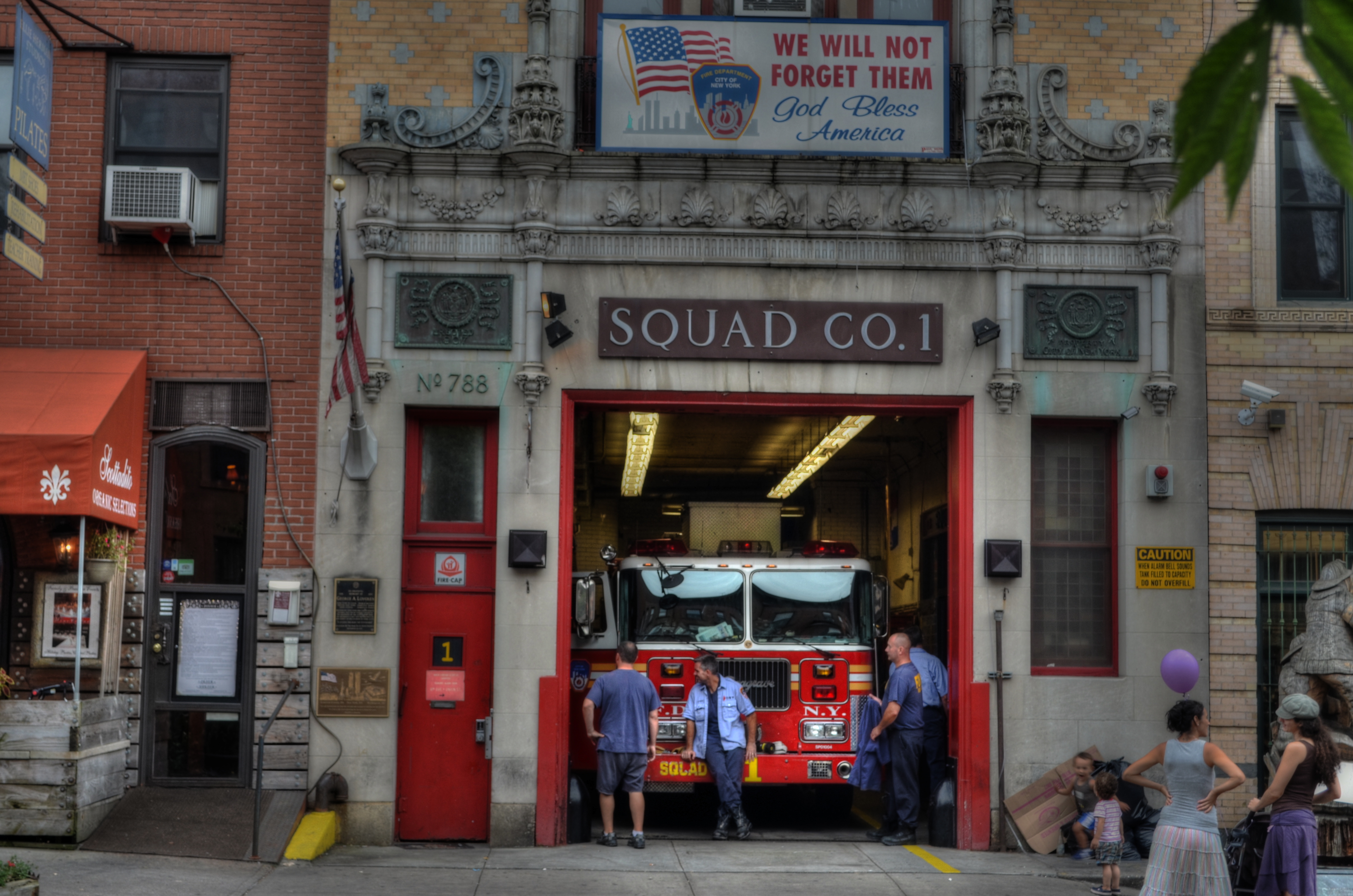 Like a theatre play, some images read best as self-contained, left-to-right "worlds". A firehouse in Brooklyn, 2012. 1/60 sec., f/6.3, ISO 100, 38mm.