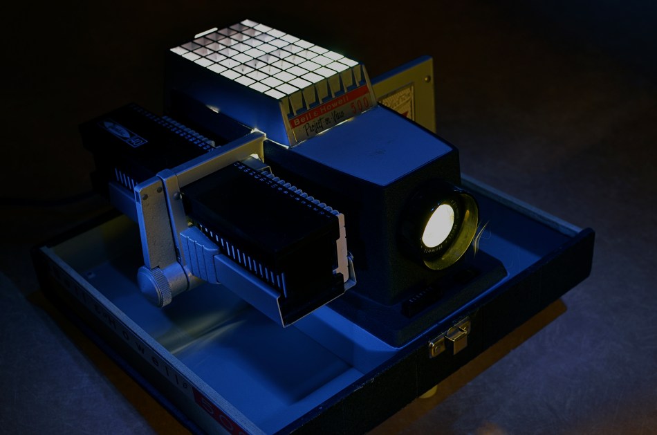 Magic in the darkness: my family's Bell& Howell 500 projector. 10 sec., f/5.6, ISO 100, 35mm.