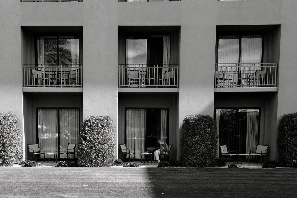 The isolation of the woman in the frame argues against garish color. 1/700 sec., f/2.2, ISO 32, 18mm.