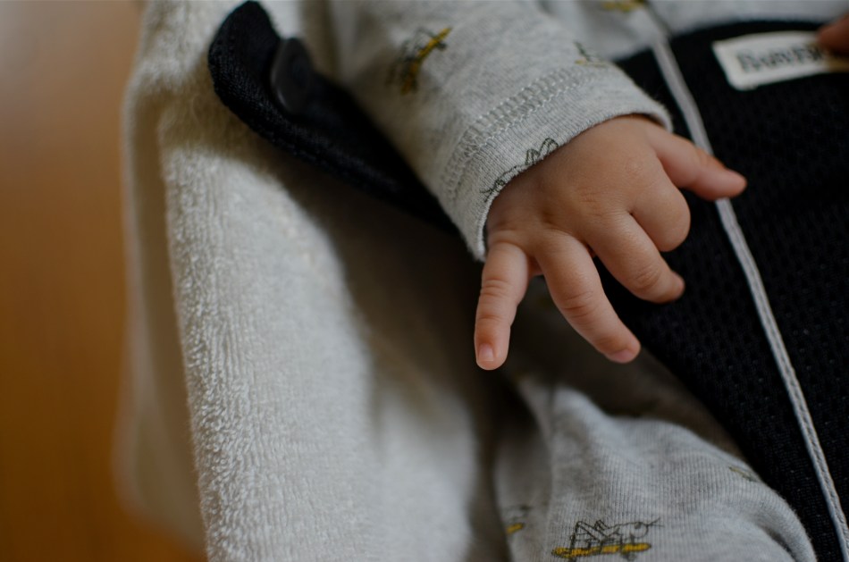 The hand that rocks (in) the cradle rules the world: 1/100 sec., f/1.8, ISO 100, 35mm.