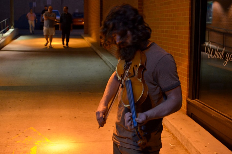 Fiddler, 2014. Too soft? Too dark? True? False? 1/50 sec., f/3.5, ISO 1000, 35mm.