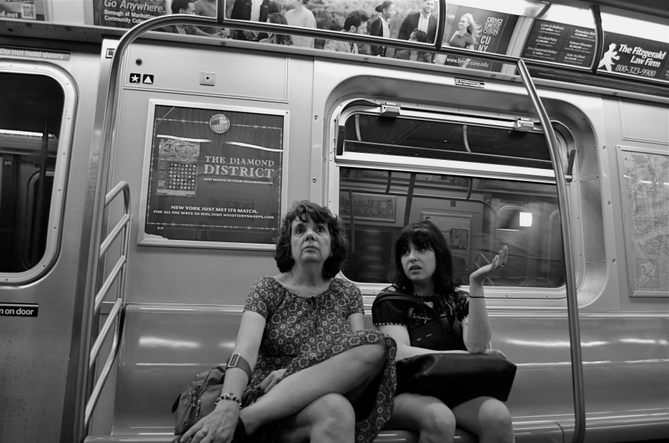 Shooting from the hip can be an urban photographer's secret weapon. 1/40 sec., f/3.5, ISO 500, 18mm.