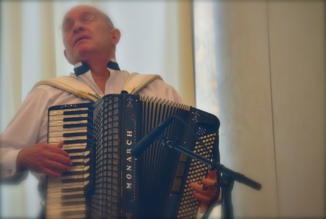 Same time of day, same room, but using a 300mm zoom. Haze added. 1/60 sec., f/5, ISO 1000, 180mm.