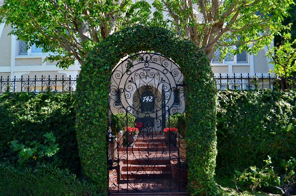 Fill flash helped rescue the tones in this lush arched gate.