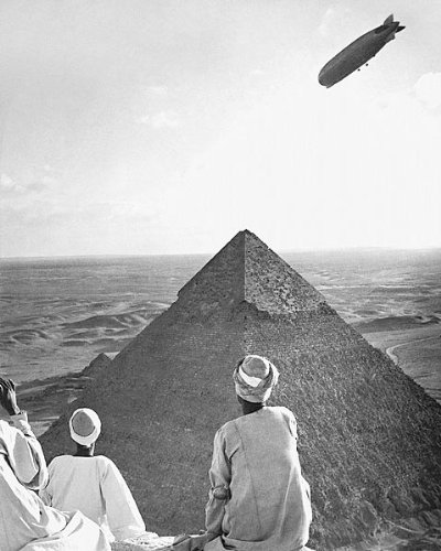 The Graf Zeppelin cruises over the great pyramids at Giza.
