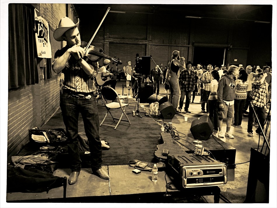 Tuning up: A fiddler runs a few practice riffs before a barn dance in Flagstaff, Arizona.