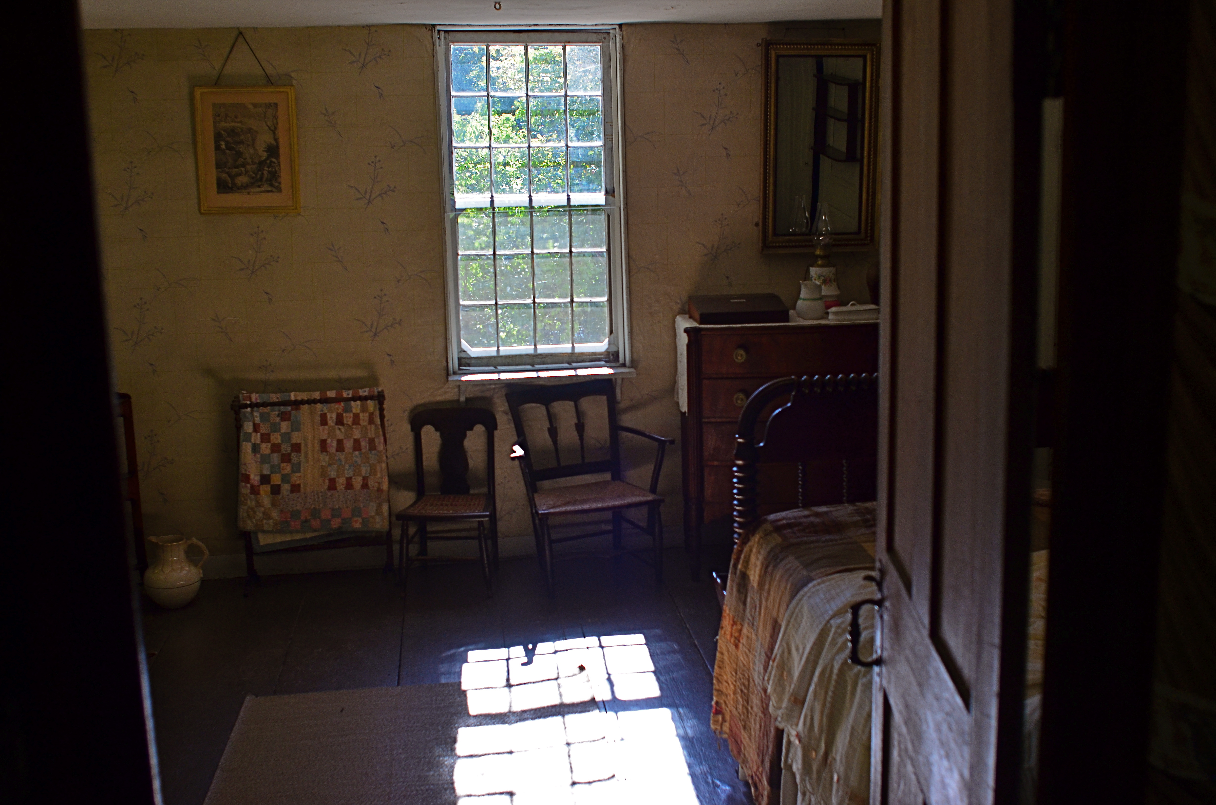 A sunlit bedroom at the Old Manse, the farm home built for the grandfather of Ralph Waldo Emerson.