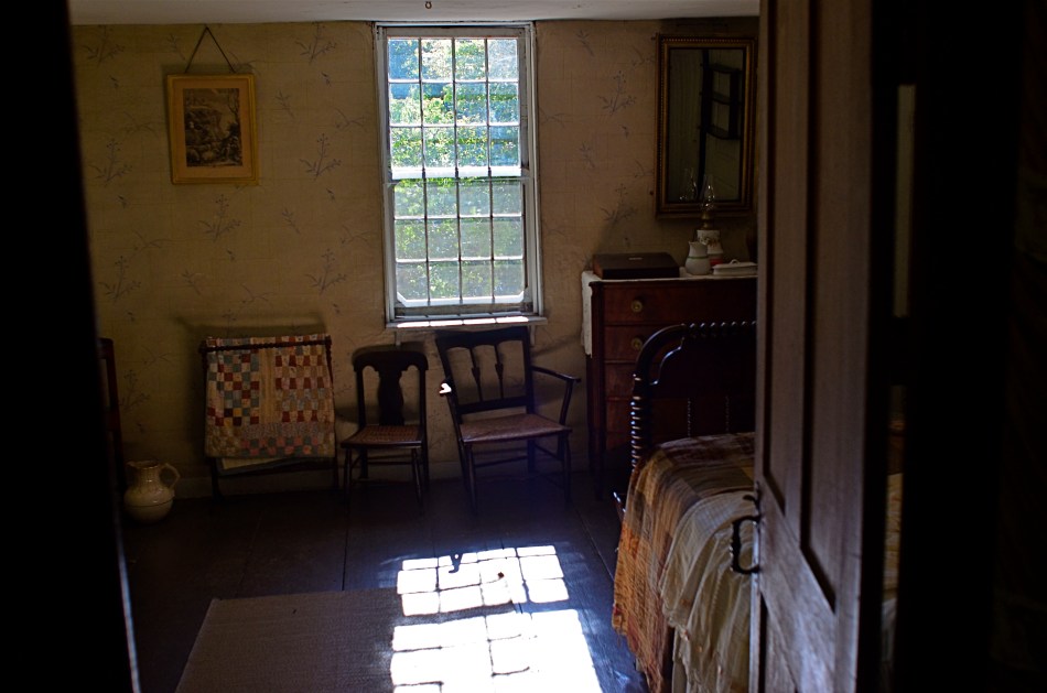 A sunlit bedroom at the Old Manse, the farm home built for the grandfather of Ralph Waldo Emerson.