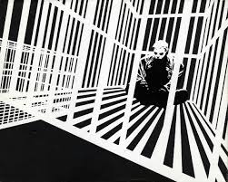 Cartoonist Frank Miller sculpts solid space out of a mix of black and white rays.