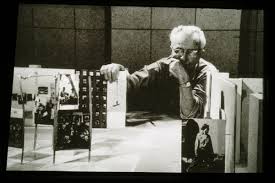 Edward Steichen looks over a scale model of the 1955 Family Of Man show, the most famous photographic exhibit of all time.