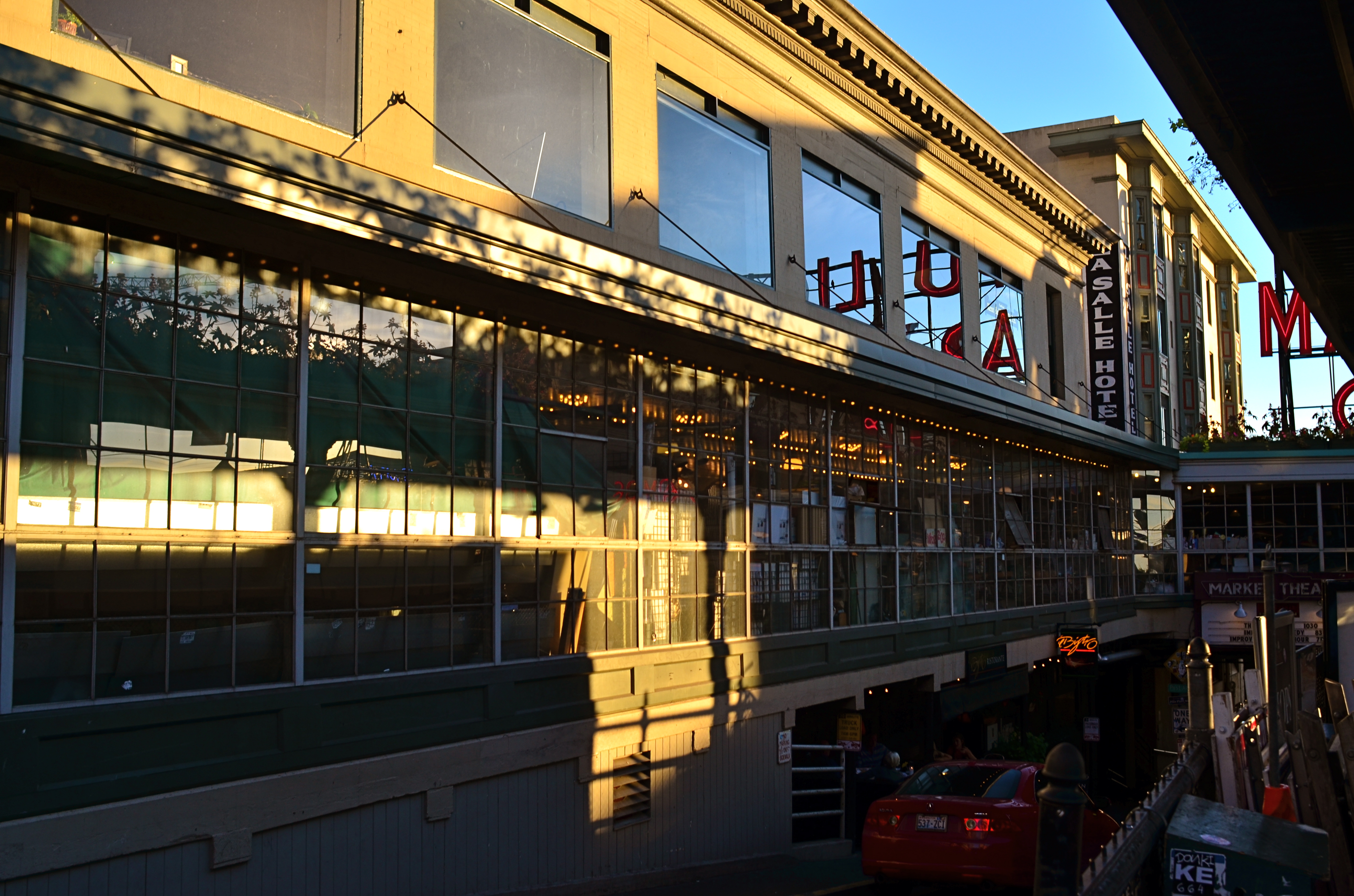 The market sign is still "there" in a sense that is known to the average viewer, but now it really is part of a marketplace.